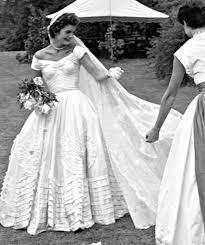 In Photos Jackie Kennedy Onassis S Iconic Style Kennedy Wedding Dress Jackie Kennedy Wedding Wedding Dresses
