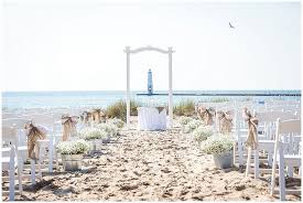 Nautical Theme Beach Wedding With Peach And Navy Blue And Tan And White Elberta Life Savin Michigan Beach Wedding Michigan Wedding Venues Wedding Venues Beach