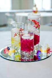 The mirror turns into the source of reflected light. Table Decor Ideas Using Mirror Centerpieces For Events Parties