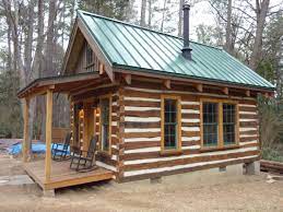 Building A Cozy Cabin Under 4 000 Tiny House Cabin Small Log Cabin Small Cabin Plans