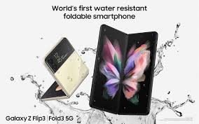 Two galaxy z fold2 phones, one in mystic bronze and one in mystic black enter from either side, half unfolded with the butterfly wallpaper onscreen. Iumdkc4zraqjum