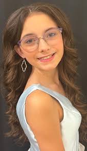 Which photographers specialize in pageant headshots and portfolios?