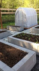 Our Garden 8 Foot Deer Fence Cinder Block Raised Bed Organic Soil Flagstone Jardin En Hauteur Jardin En Carre Amenagement Jardin Carre