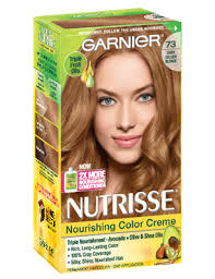 Permanent, nourishing hair color creme with three fruit oils, for all hair textures. Nutrisse Nourishing Color Creme Dark Golden Blonde 73 Garnier Light Hair Color Hair Color Dark Golden Blonde