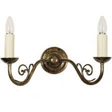 These are qualities prized in fine victorian chandeliers and wall sconces created long ago. Traditional Double Wall Light Candle Style With White Candle Sleeves