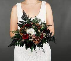 Lissette carried a diy bouquet of purple wildflowers and pinecones that tied in the natural winter scenery at lake tahoe. Burgundy Roses Winter Bridal Bouquets Green Real Touch Peonies Burgundy Navy Wedding Bouquet Pine Cones Bouquets Weddings Valresa Com
