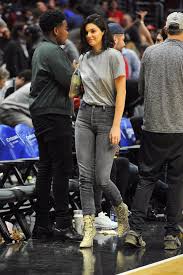 Phoenix suns star devin booker and kendall jenner were first linked last april. We Re Thankful Kendall Jenner Sat Courtside Because You Need A Better Look At Her Boots Kendall Jenner Outfits Gaming Clothes Kylie Jenner Outfits