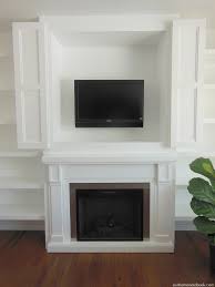 Check spelling or type a new query. Remodelaholic Built In Fireplace Surround And Shelving With Hidden Tv Nook