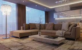 Ampio E Moderno Salotto Arredato Con Un Divano Angolare E Tende Color Tortora Soggiorno Di Lusso Design Divano Idee Arredamento Soggiorno