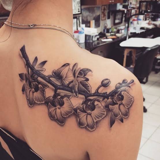 Orchid vine tattoo grey tattoo flower tattoo shoulder tattoo back tattoo floral tattoo vine tattoo