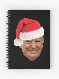 Carnet for Sale avec l'œuvre « Donald Trump portant un bonnet de noel  produit de vacances » de l'artiste tronictees