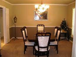 In rooms with a clear separation to the wall, such as a chair rail, painting the wall below the chair rail a darker color than above the chair rail adds drama as well as dimension. Chair Rail Dining Room Colors Charming Dining Room Dining Room Chair Rail