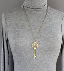 Looking for fancy old fashioned fonts? Skeleton Key Necklace 27 Long Necklace Chain Skeleton Key Outline Pendant Bronze Antiqued Gold Color Old