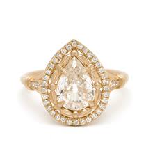 We create our diamond wedding bands with a variety of different settings , each with its own unique look and advantages. One Of A Kind Engagement Rings Athena Halo Ii Pear Shape Diamond Ring
