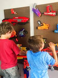 Wall control pegboard organizers have become very popular for organizing nerf guns and nerf blasters. Diy Pegboard Nerf Gun Storage Moments With Mandi