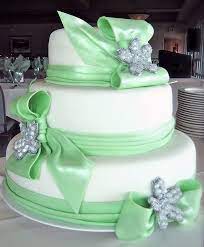 Three Tier Wedding Cake With Seafoam Green Fondant Ribbons And Edible Sugar Diamond Brooches Wedding Cake Simple Elegant Simple Wedding Cake Big Wedding Cakes