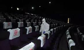 Watching movie in touring talkies