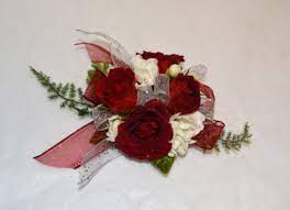 Send flowers and gifts internationally to usa, canada, uk, china & 190 countries worldwide. Red Passion Corsage In Store Pick Up Only Wrist Corsage In Holland Mi Glenda S Lakewood Flowers