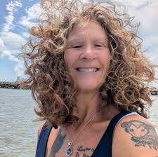 Is there anyone able to pick up a deceased dark stripe tabby cat in Bear?