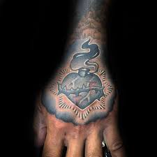 Top 99 Sacred Heart Tattoo Ideas 2021 Inspiration Guide Sacred Heart Tattoos Heart Tattoo Tattoo Designs Men