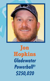 Groves resident claims $2.5M prize from lotto ticket