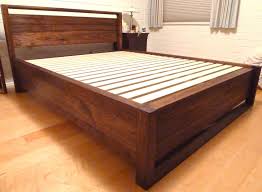 A rich cherry sleigh bed frame with storage in the footboard. Beds Bed Frames And Headboards Storage Beds Custommade Com