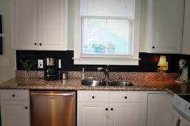 I just rolled on two coats of chalkboard paint, let it dry, and it was finito benito! Chalkboard Paint Backsplash Honestly West