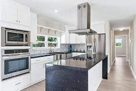 It is an excellent surface for kitchen worktops, bathrooms and wet rooms. White Kitchen Cabinets With Dark Countertops Dark Countertops White Kitchen Cabinets Kitchen Cabinets With Dark Countertops