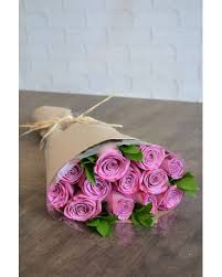 Being a winter flower, they can be spotted in christmas arrangements. Wrapped Roses In Purple Jennie S Flowers