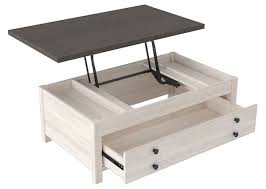 This piece can be use for a laptop or a snack while. Dorrinson Rect Lift Top Cocktail Table Ashley Homestore Canada