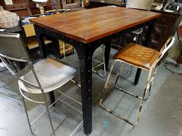 Use a counter height table with. Rustic Industrial Dining Table This Tall Dining Table Has A Natural Wood Top Mounted On A Black Riveted Iron Base Perfect In Your Dining Room Or Art Room