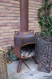 Certified chimney sweeps discuss common problems that homeowners face with wood burning stoves and the solutions for repairs, cleanings & maintenance. Pin By Lisa Fladt Gregor On My Home Ideas Metal Fire Pit Outdoor Propane Fireplace Propane Tank Art