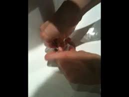 removing a stuck sink stopper