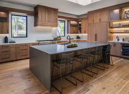 New white shaker kitchen wood cabinets & bathroom vanity cupboards! Tour This Light Filled Modern Home In A Woodland Setting Of Oregon Modern Walnut Kitchen Walnut Kitchen Kitchen Remodel