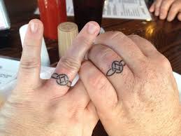 More than just beautiful pieces of jewelry, your engagement and wedding rings symbolize a promise of your commitment to one another, your future experiences and. Celtic Symbol Serch Bythol Everlasting Love Matching Tattoos With My Husband On Ring Finger Ring Finger Tattoos Celtic Ring Tattoo Finger Tattoo For Women