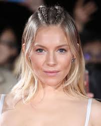 The actress, who has steadily lightened her hair to a pale golden hue over the past few months, was spotted in london last night with her wavy chop updated by way of a new warm apricot undertone and darker. Sienna Miller Hair Every One Of Sienna Miller S Bohemian Hair Styles