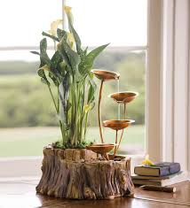 When I Think Nature My Mind Automatically Goes To Water So I Thought Maybe A Cute Table Top Fountain Would Diy Fountain Indoor Water Garden Diy Water Fountain