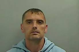 Knife-wielding ex barged into home and threatened to kill himself before  spitting at police officer