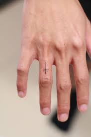 They are striking, often symbolic, and can be incorporated into a variety of designs. Cross Tattoo On Finger Cross Simple Tattoos Simple Tattoos Momcanvas