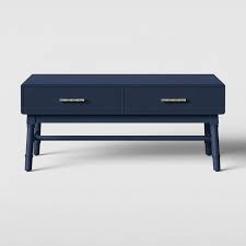 Coffee tables can become the hub of your living space, adding a touch of style as well as the substance of everyday practicality. Oslari Navy Bamboo Gold Accent 2 Drawer Coffee Table