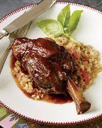 Braised Lamb Shanks With Garlic And Indian Spices With The Wolftrap Red Lamb Shanks Spice Recipes Braised Lamb Shanks