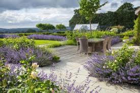 Sweeps Of Catmint And Roses Create Calming Landscape Acres Wild Design English Garden Design Garden Design Pictures Garden Design