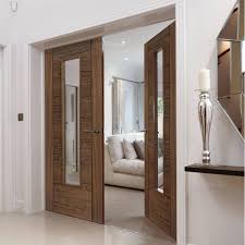 J B Kind Emral Walnut Door Pair Clear Glass Prefinished Dark Interior Doors Walnut Doors Doors Interior Modern