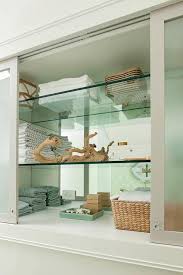 The maax corner glass shelf is a storage solution that you'll find as pleasing to the eyes as it is convenient to your reach. Built In Bathroom Cabinet With Glass Shelves Transitional Bathroom