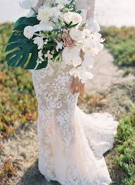 Great ideas for a tropical wedding. An All White Wedding With A Chic Tropical Twist Wedding Bridal Bouquets Tropical Wedding Bouquets Diy Wedding Flowers
