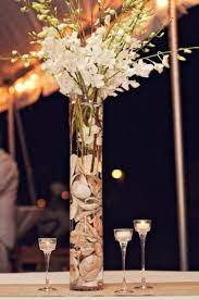 Depending on a type of wedding, that wish to organize a bride and groom, the details of decor will be different. 40 Amazing Beach Wedding Centerpieces Weddingomania Wedding Centerpieces Beach Wedding Centerpieces Beach Centerpieces