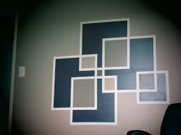 After Painting A Wall The Color You Want Tape It Off In A Design You Want Using Frog Tape In My Ca Diy Wall Painting Wall Paint Designs Painting Tape Designs