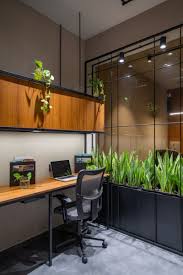 Topped by a white cupola, this traditionally styled bank, office or medical building was built on a hill. Office Design Keeping The Material Palette Natural Simple Interior Muse The Architects Diary