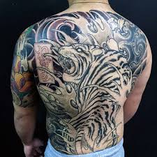 The back offers a massive canvas. Cool Back Tattoo Design Ideas For Men The Best Picture Design Ideas For Back Pictures Body Tattoo Art