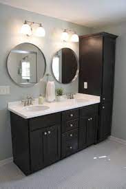 A master bathroom in need of an update was modernized with a barn door, new vanity and modern natural tile selections. Nice 52 Adorable Bathroom Cabinet Paint Color Ideas Https About Ruth Com 2017 09 1 Black Cabinets Bathroom Palladian Blue Bathroom Bathroom Cabinets Designs